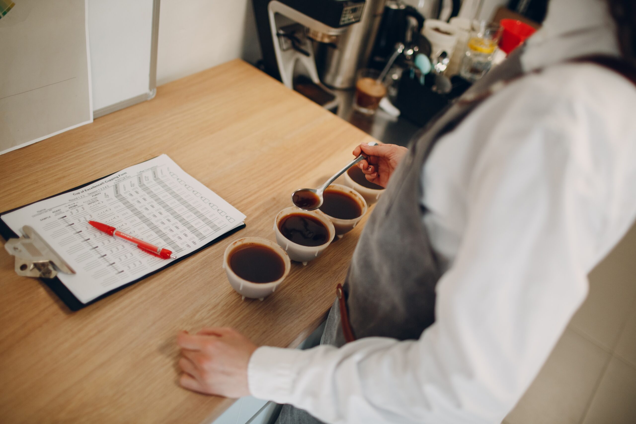 Cup,Taster,Woman,With,Spoon,In,Hands,Tasting,Degustation,Coffee
